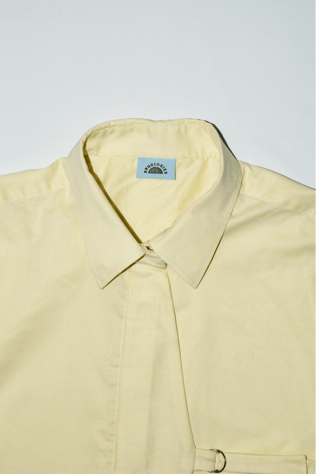Asymmetric Shirt Buckles Butter Yellow