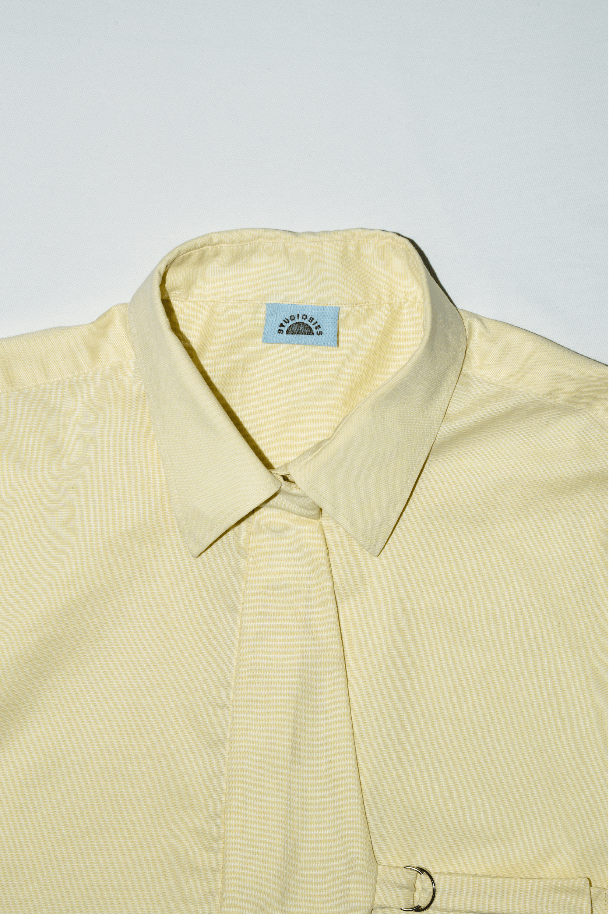 Asymmetric Shirt Buckles Butter Yellow